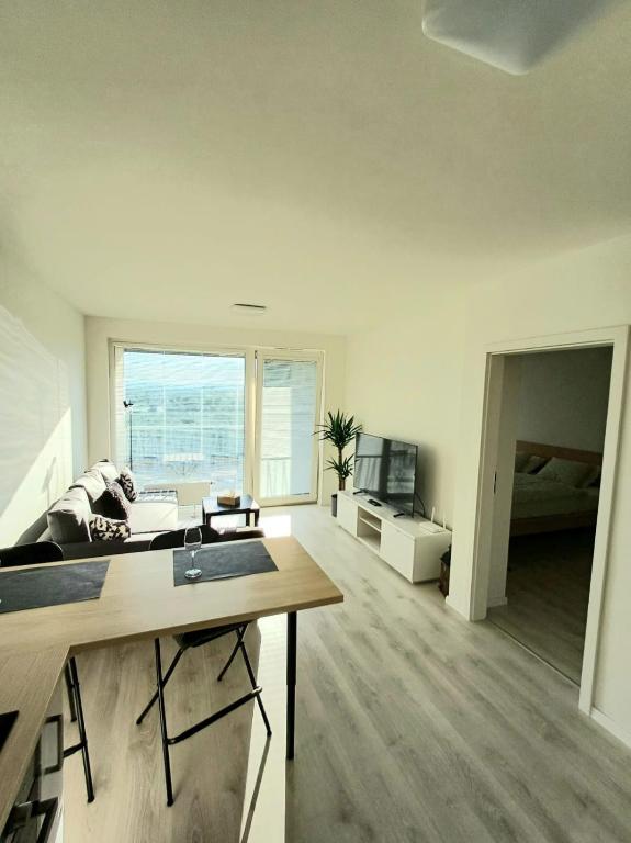 New apartment 5 minutes by walk from the airport with free garage parking